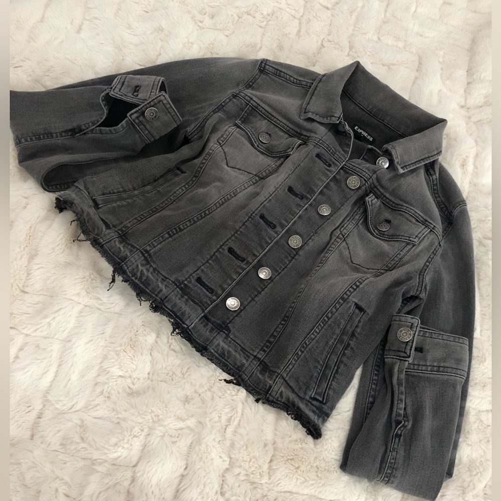 Gently worn Small Express collared jean jacket with fringe/distressed detail